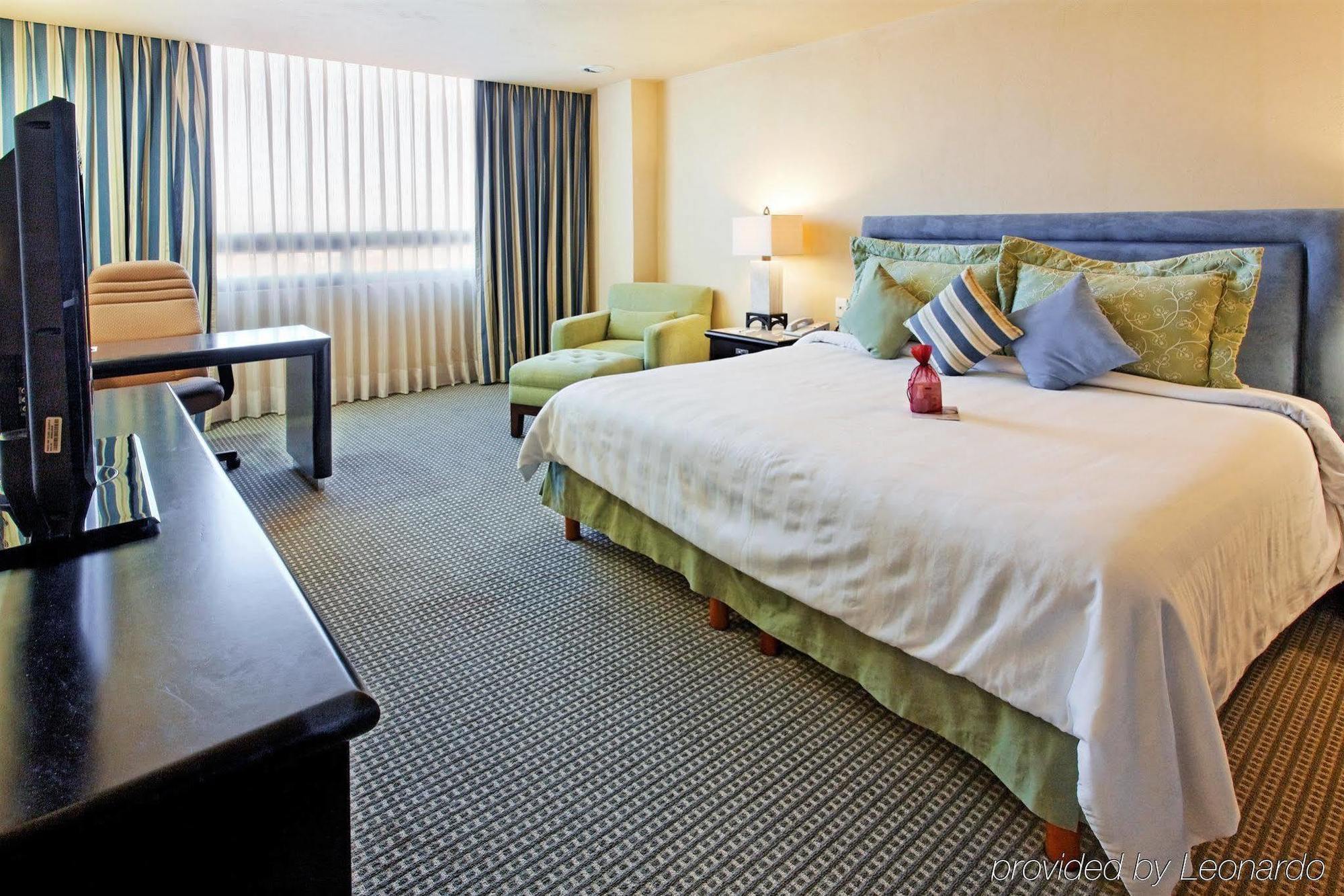 Gamma By Fiesta Americ Xalapa Nubara Cameră foto A room at the hotel